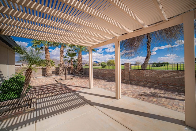 13779 E 54th Dr, Yuma, AZ 85367 - view of patio featuring a fenced backyard and a pergola
