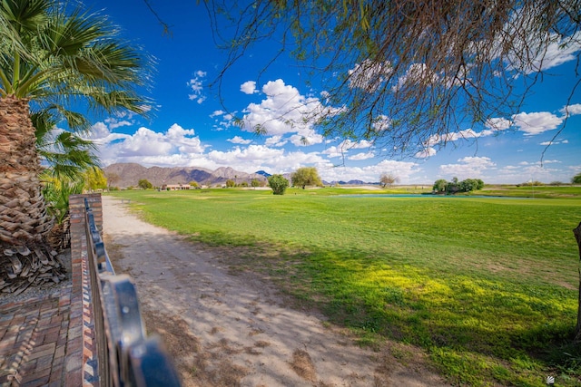 13779 E 54th Dr, Yuma, AZ 85367 - view of property's community featuring a lawn and a mountain view