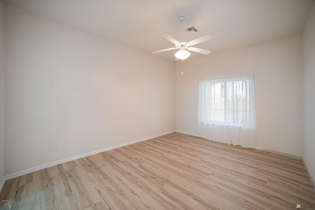 13779 E 54th Dr, Yuma, AZ 85367 - unfurnished room featuring visible vents, light wood finished floors, ceiling fan, and baseboards