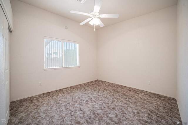13779 E 54th Dr, Yuma, AZ 85367 - empty room featuring baseboards, a ceiling fan, and carpet flooring