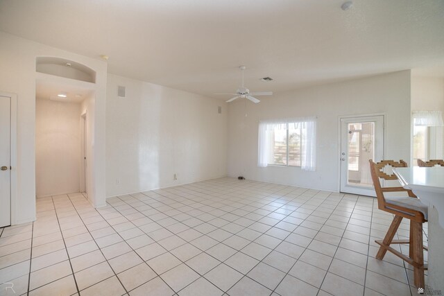 13779 E 54th Dr, Yuma, AZ 85367 - spare room with light tile patterned floors, ceiling fan, and visible vents