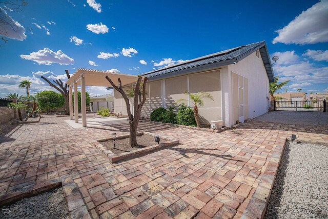 13779 E 54th Dr, Yuma, AZ 85367 - view of patio featuring a fenced backyard and a pergola