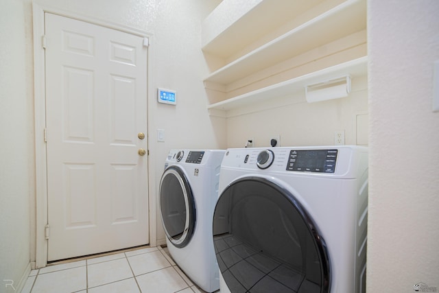 13779 E 54th Dr, Yuma, AZ 85367 - washroom with laundry area, light tile patterned flooring, and washer and dryer
