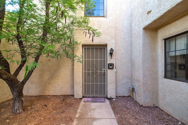 12402 E Via Estrella, Yuma, AZ 85367 - view of exterior entry with stucco siding