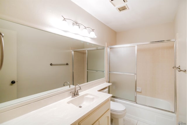 12402 E Via Estrella, Yuma, AZ 85367 - full bath featuring vanity, toilet, enclosed tub / shower combo, and tile patterned flooring