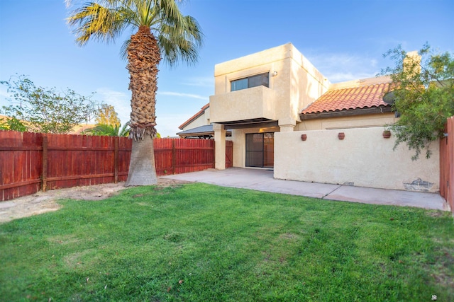 12402 E Via Estrella, Yuma, AZ 85367 - rear view of property with stucco siding, a patio area, and a tiled roof