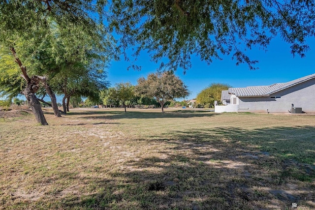 view of yard with central AC