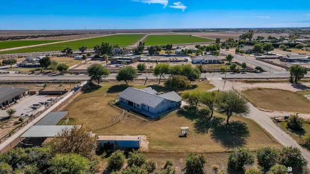 birds eye view of property featuring a rural view