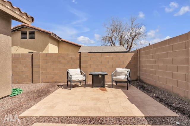 view of patio featuring a fenced backyard