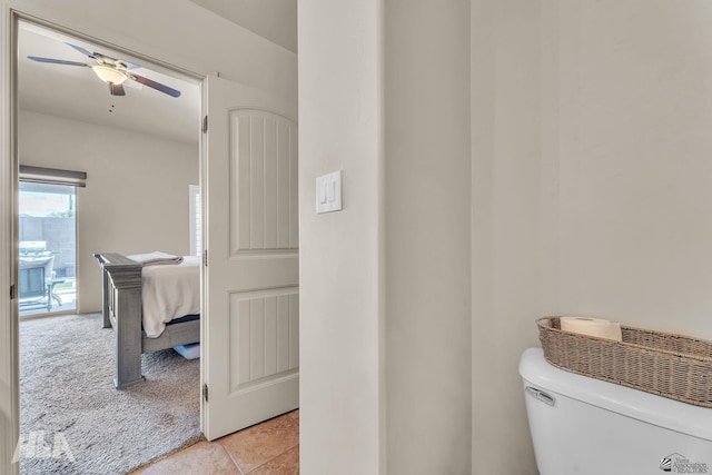 bathroom with toilet and ceiling fan