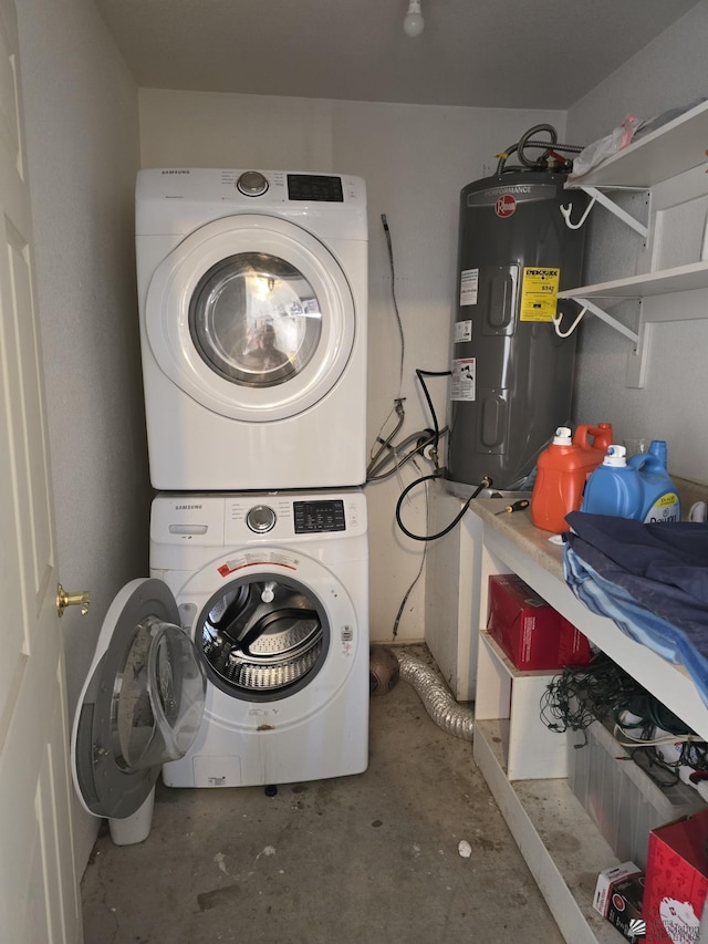 laundry area with water heater and stacked washing maching and dryer