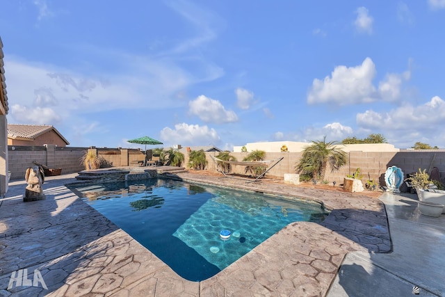 view of swimming pool featuring a patio