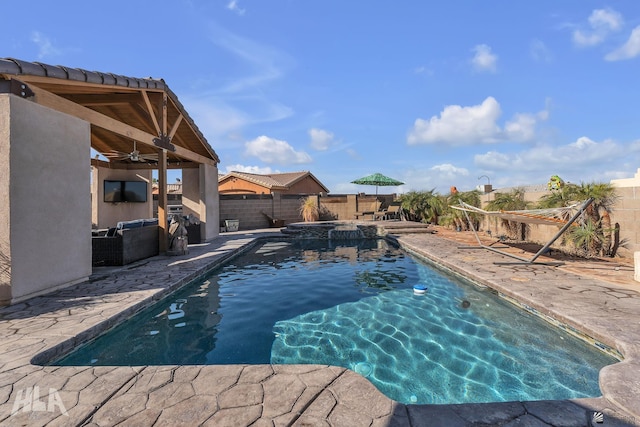 view of pool featuring a patio area and ceiling fan