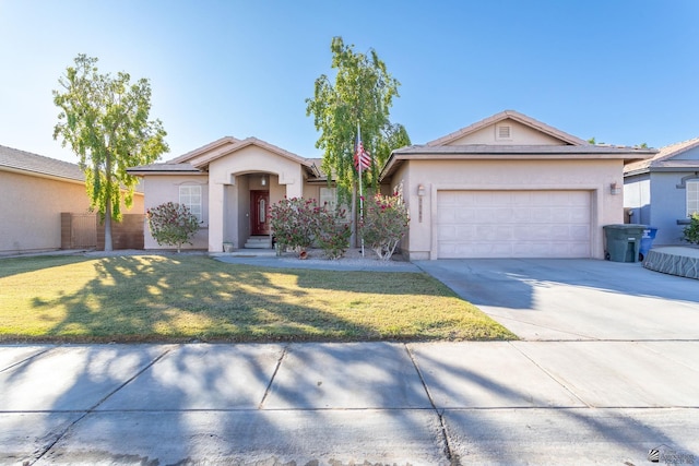 ranch-style home with a front yard and a garage