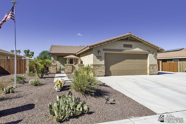 view of front of home with a garage