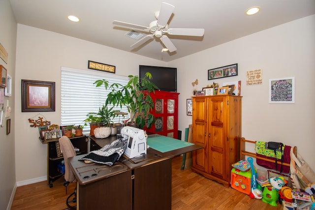 office area featuring light wood-type flooring and ceiling fan