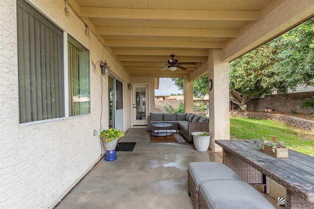 view of patio featuring an outdoor hangout area and ceiling fan