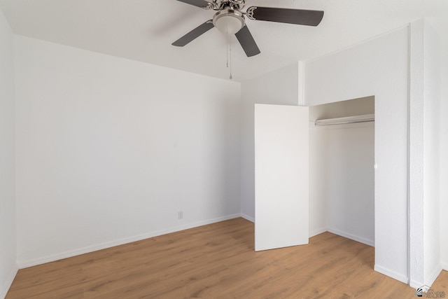 unfurnished bedroom with ceiling fan, light hardwood / wood-style floors, and a closet