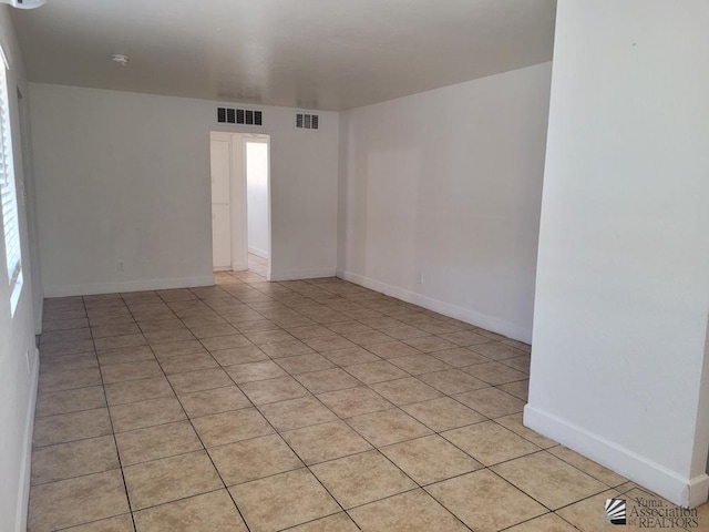 view of tiled spare room