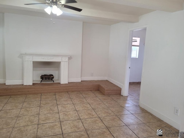 unfurnished living room featuring beamed ceiling, light tile patterned floors, and ceiling fan