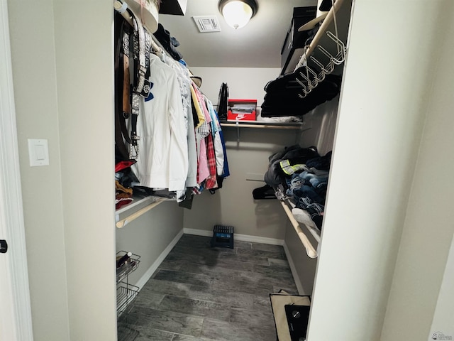 spacious closet with visible vents and wood finished floors