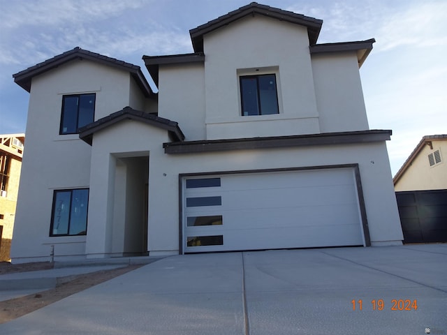 view of front of house with a garage