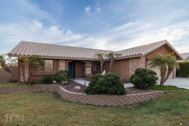 view of front of home with a front lawn