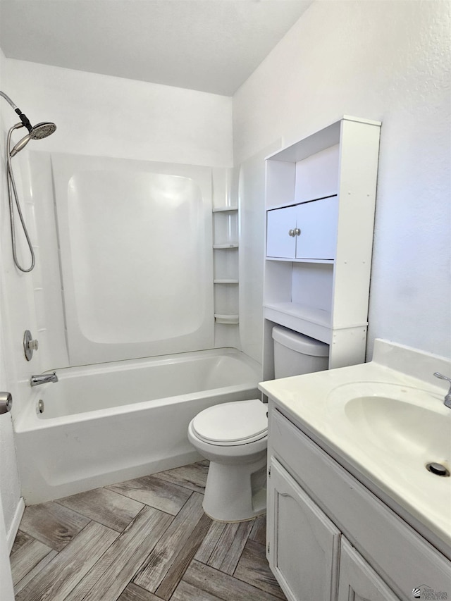 full bathroom with vanity, toilet, and bathtub / shower combination