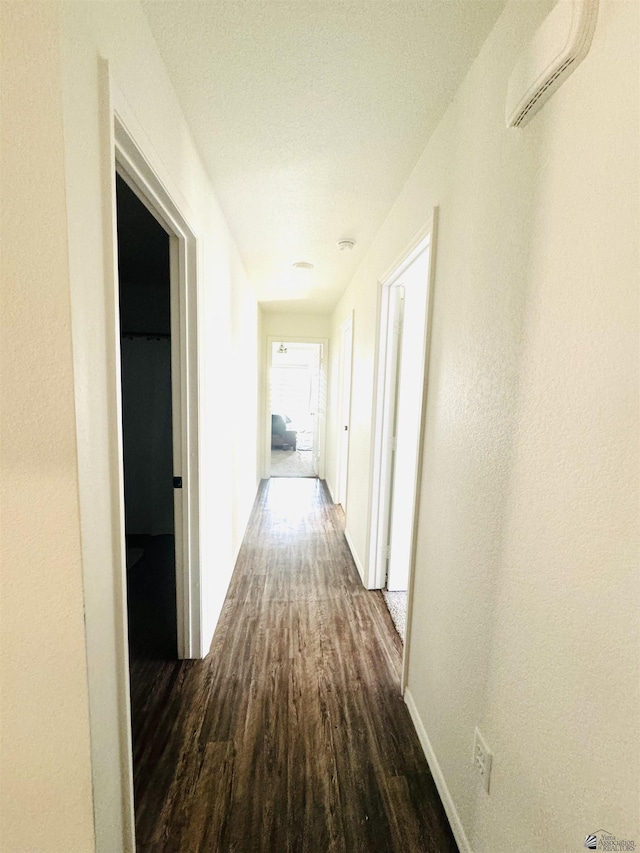 hall with dark hardwood / wood-style floors