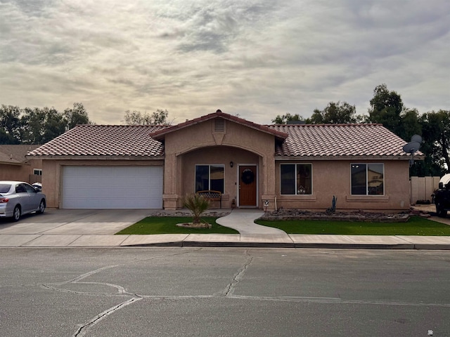 view of front of home with a garage