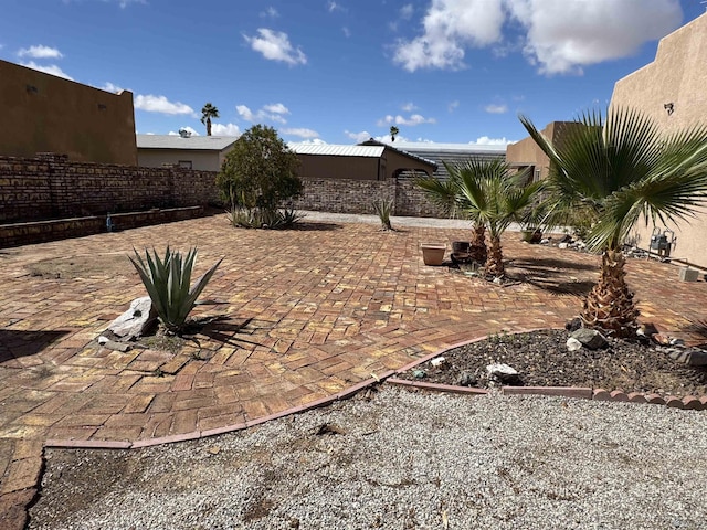 view of patio / terrace with fence