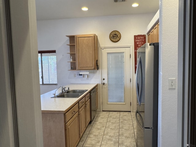 kitchen with a sink, light countertops, light tile patterned floors, stainless steel appliances, and open shelves