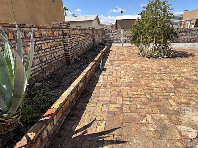 view of patio featuring a fenced backyard