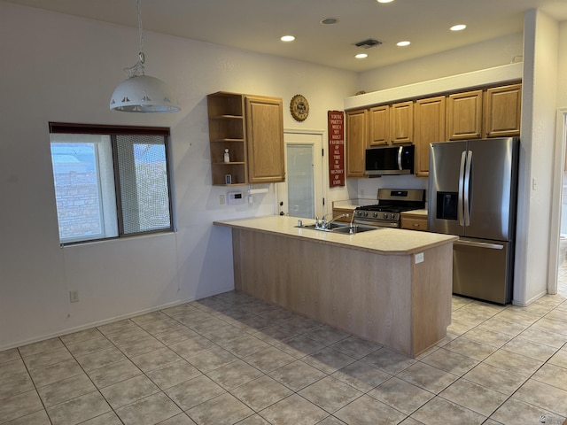 kitchen featuring visible vents, light countertops, appliances with stainless steel finishes, a peninsula, and open shelves