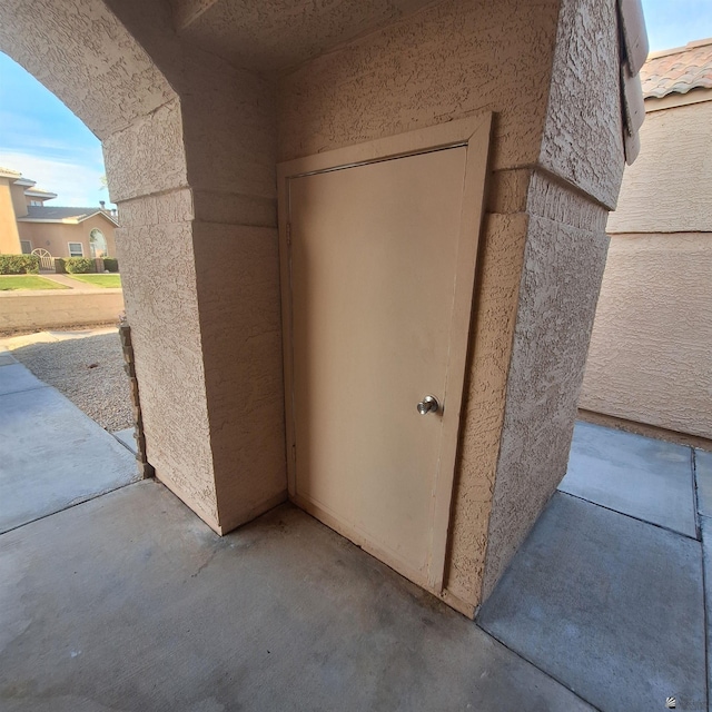 exterior space featuring stucco siding