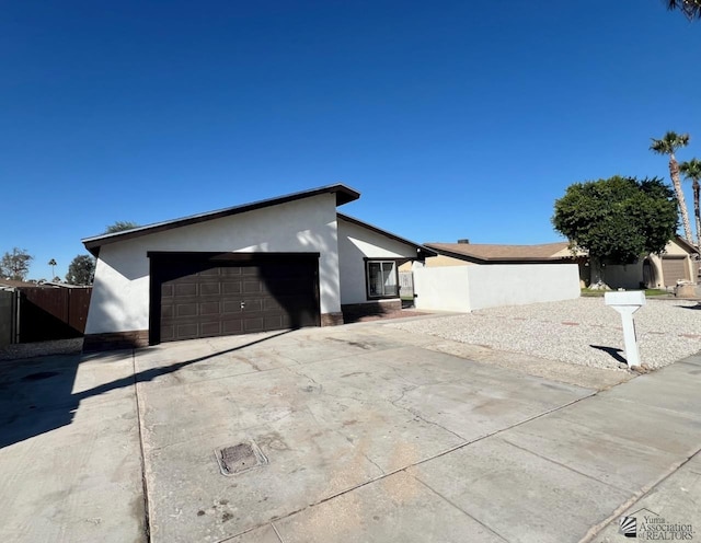 view of side of home with a garage