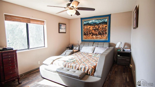 bedroom featuring ceiling fan and dark wood-type flooring