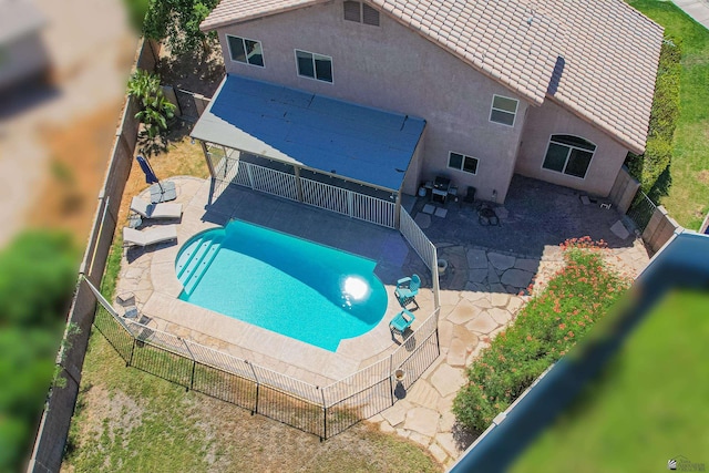 view of pool featuring a patio area