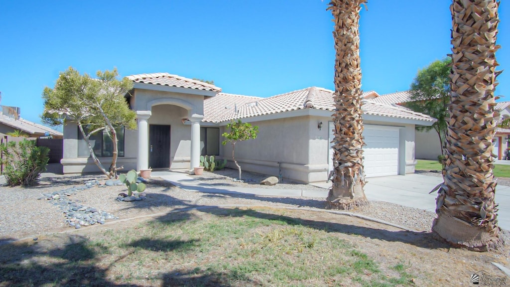 view of front of property with a garage