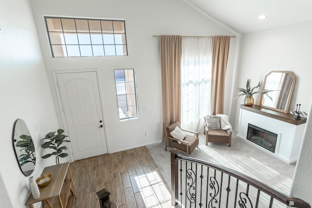 entryway with hardwood / wood-style floors