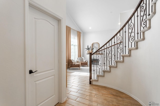 foyer with lofted ceiling