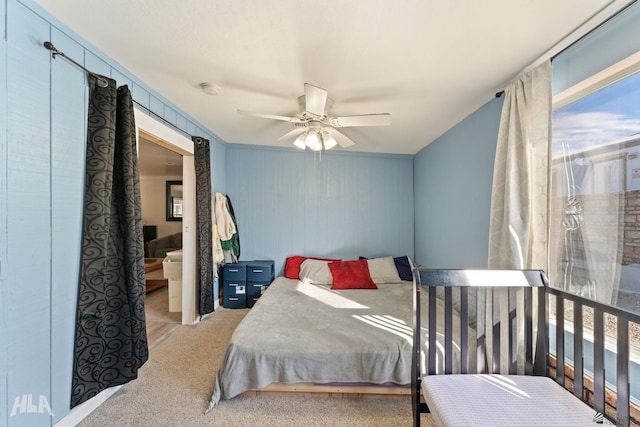 bedroom with ceiling fan and carpet floors