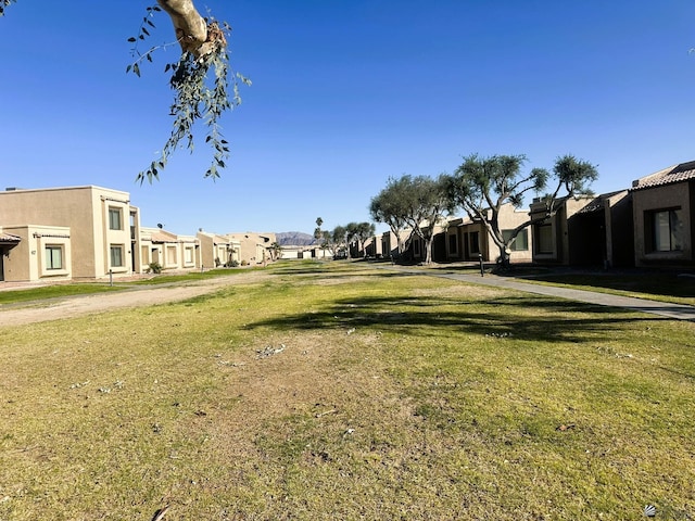 view of yard featuring a residential view