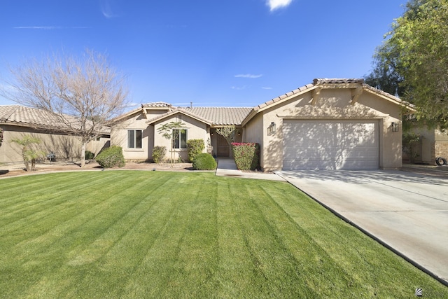 view of front of property featuring driveway, a front lawn, a tile roof, and stucco siding