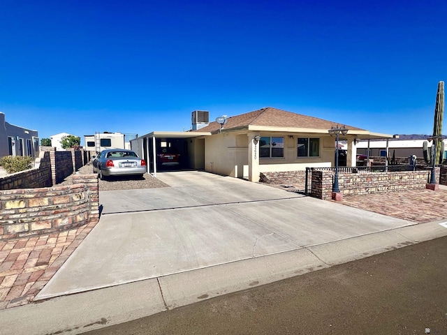 view of front of house with a carport