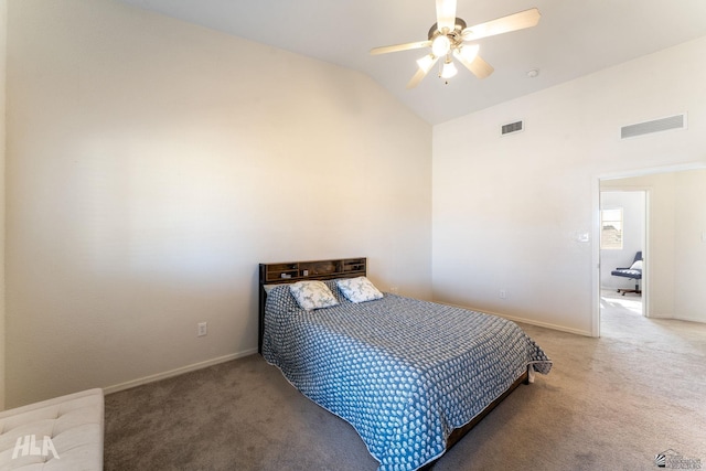 carpeted bedroom with vaulted ceiling and ceiling fan