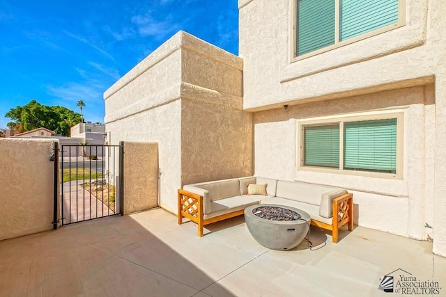 view of patio featuring an outdoor fire pit