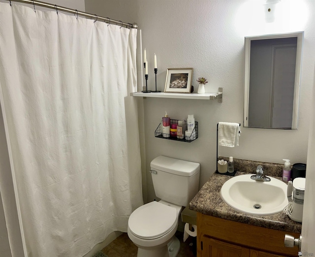 full bath with vanity and toilet