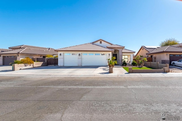 view of front of property featuring a garage