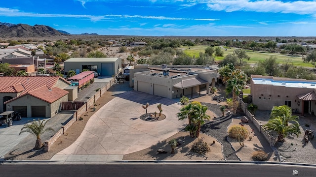 bird's eye view featuring a residential view and a mountain view